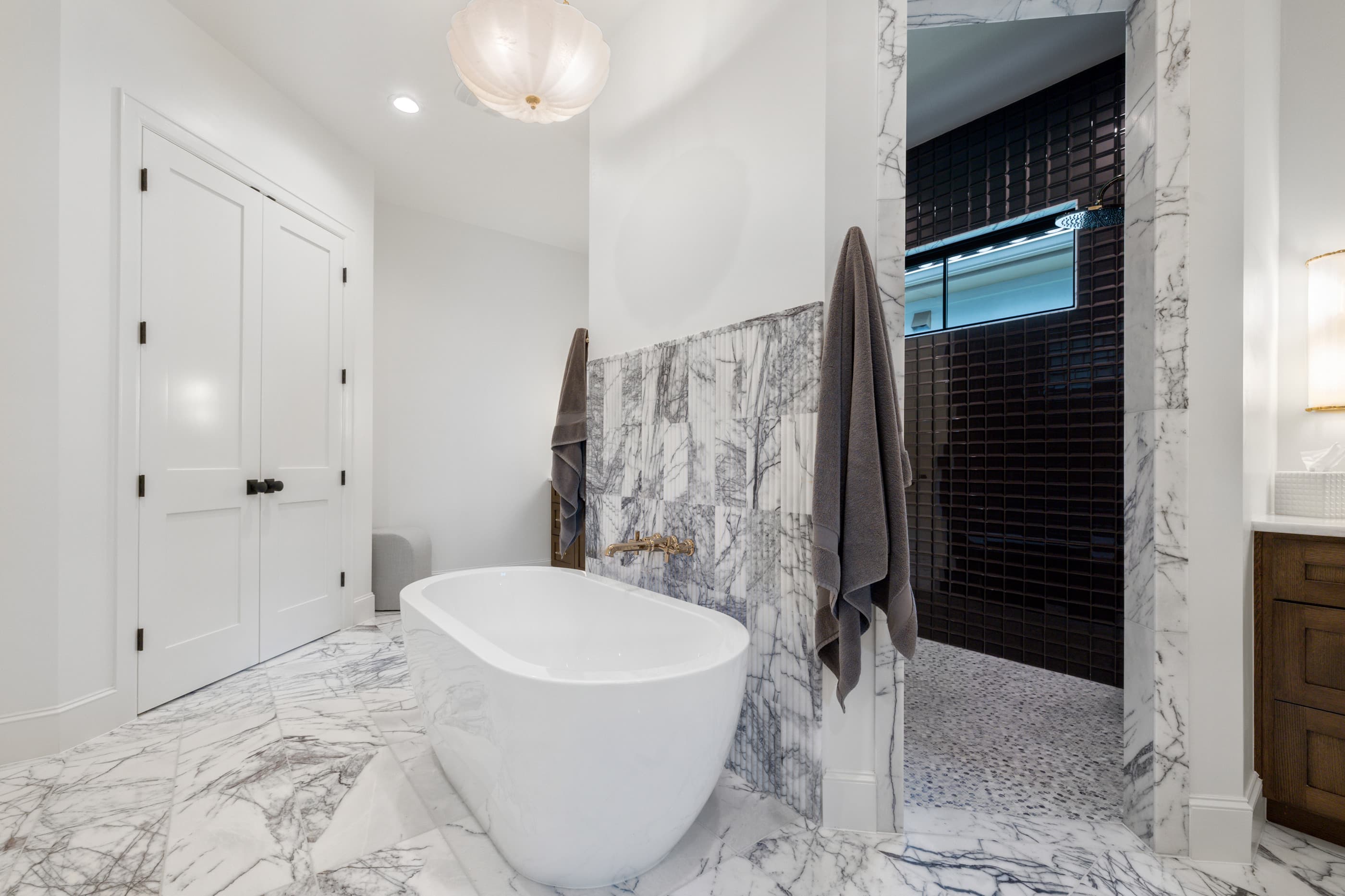 Primary bathroom with freestanding soaking tub